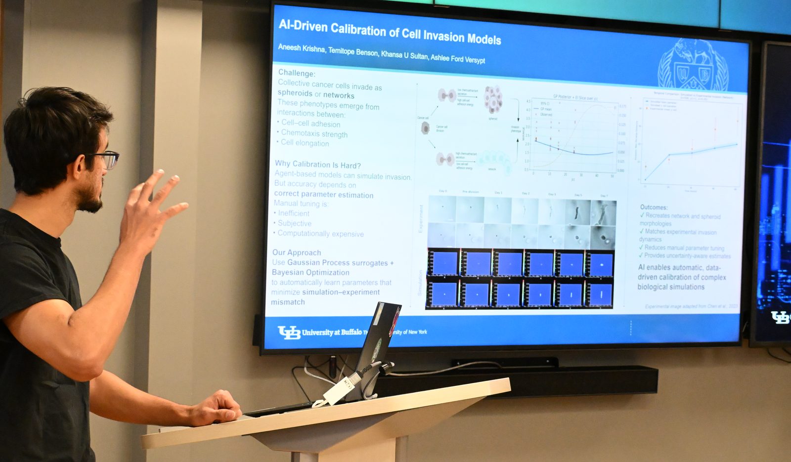 Aneesh presenting the cell invasion calibration project beside his slide