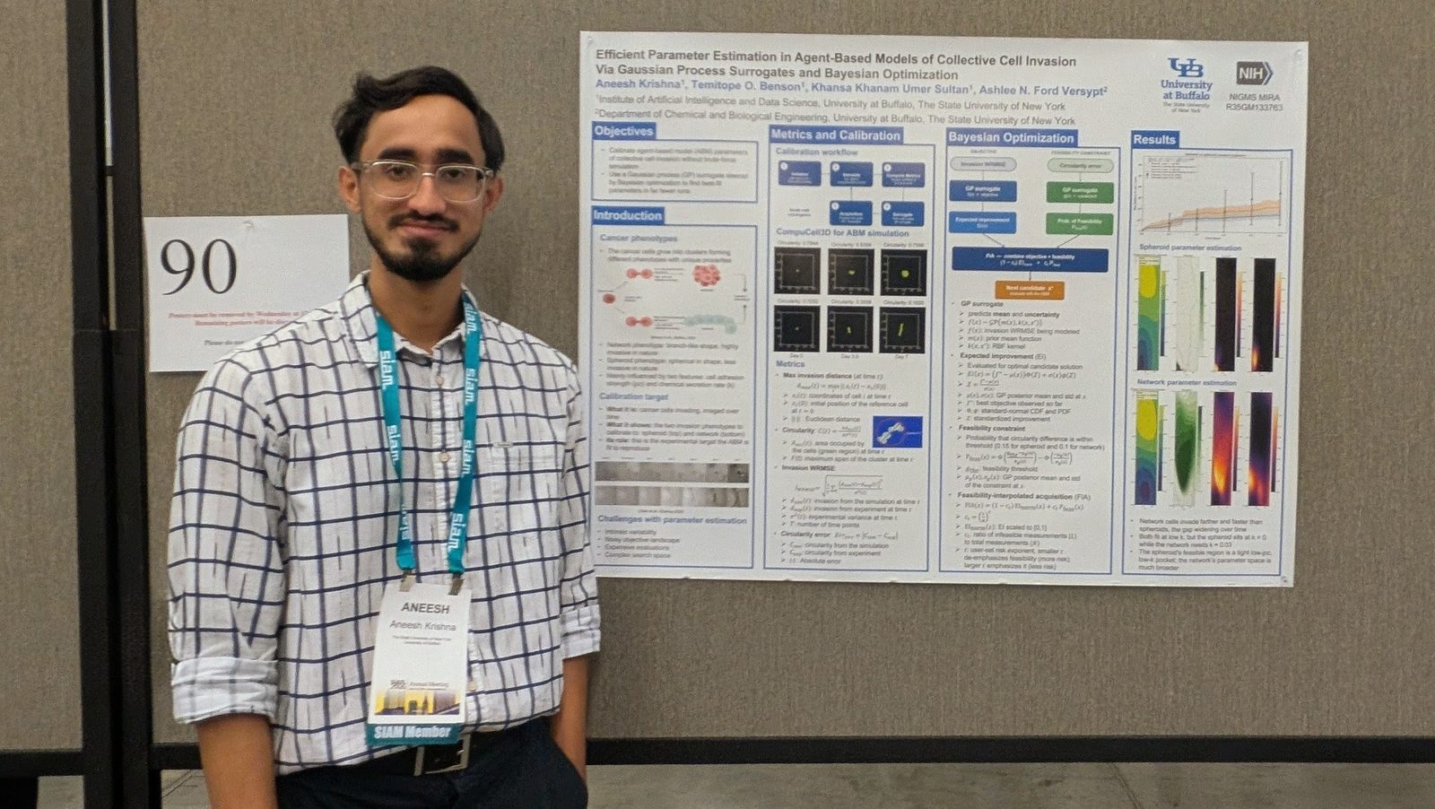 Aneesh next to his research poster at the SIAM Conference on the Life Sciences